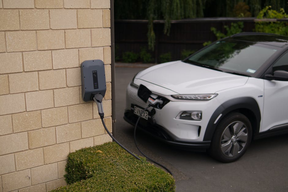 A car parked on the side of a building